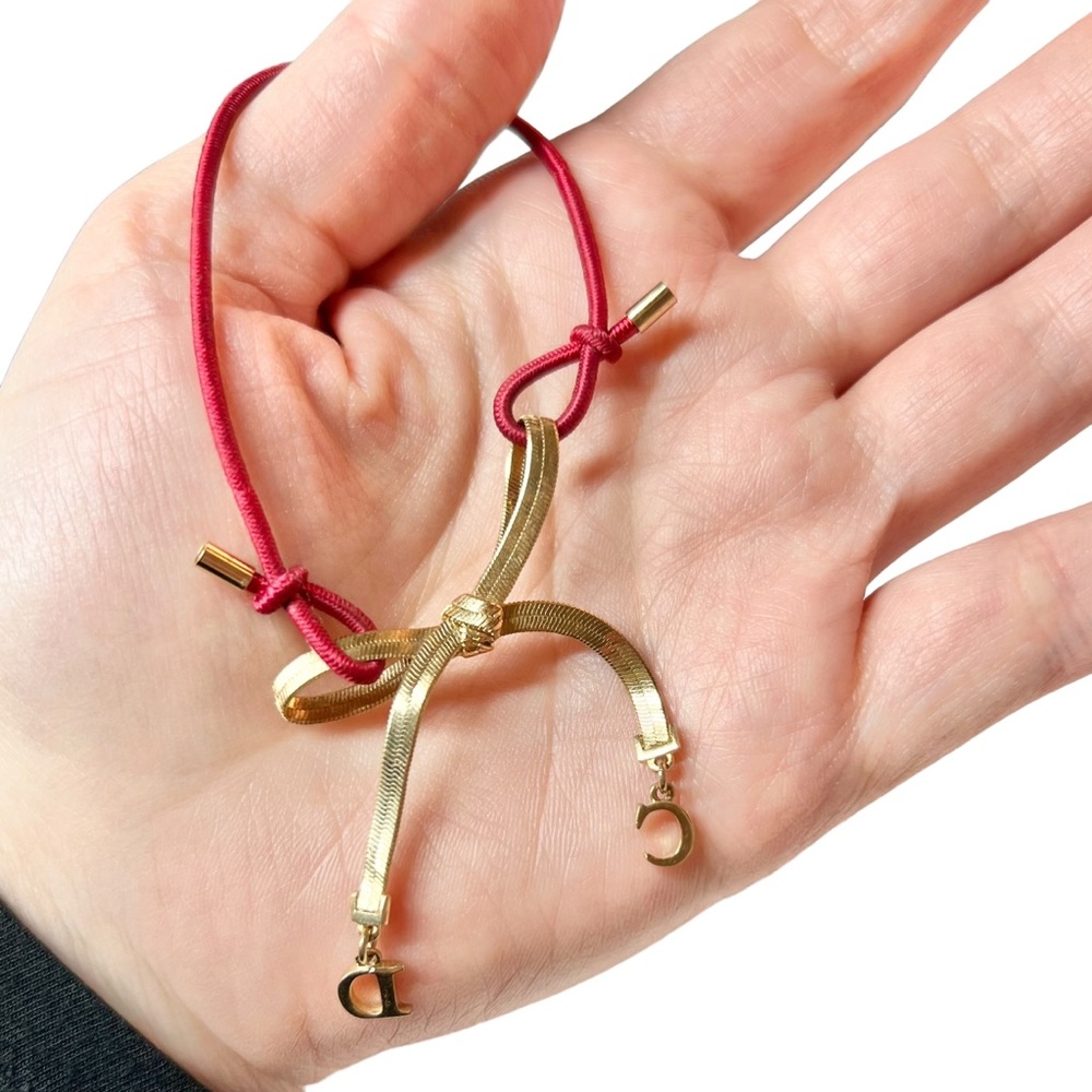 VTG AUTH Christian Dior Red Elastic Gold Chain CD Logo Bow Charm Bracelet - Picture 11 of 12